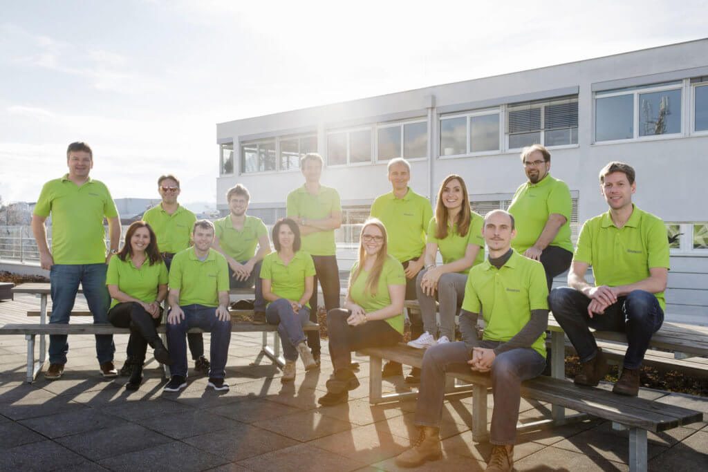 Eine Grruppenbild von Personen mit grünen T-Shirts